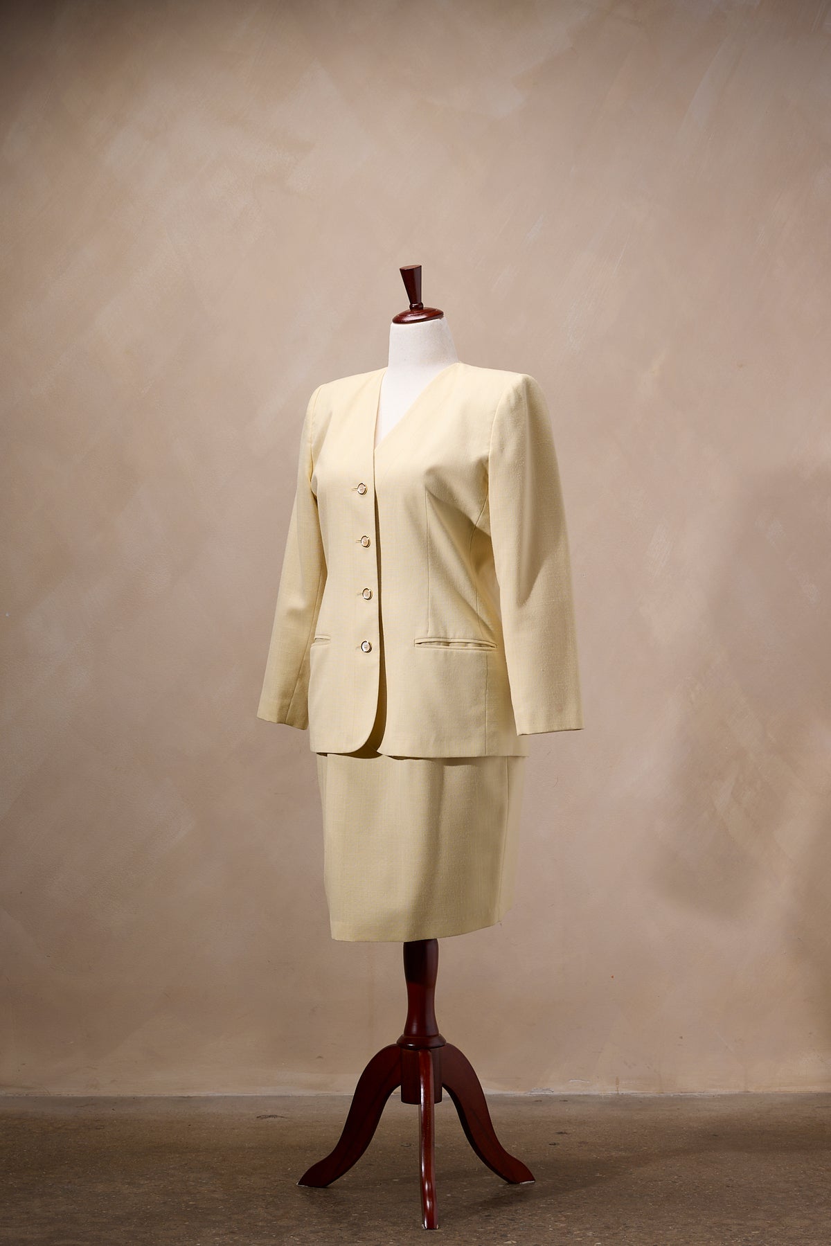 Pale Yellow Two-Piece Blazer & Pleated Skirt Set