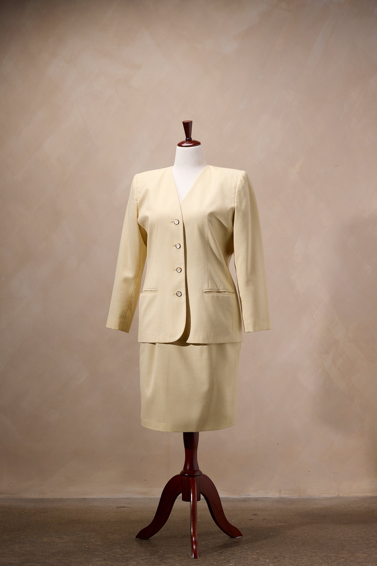 Pale Yellow Two-Piece Blazer & Pleated Skirt Set